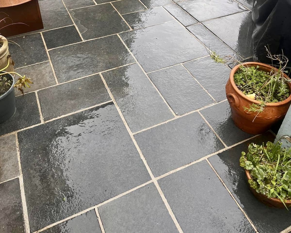 dark patio pressure washed